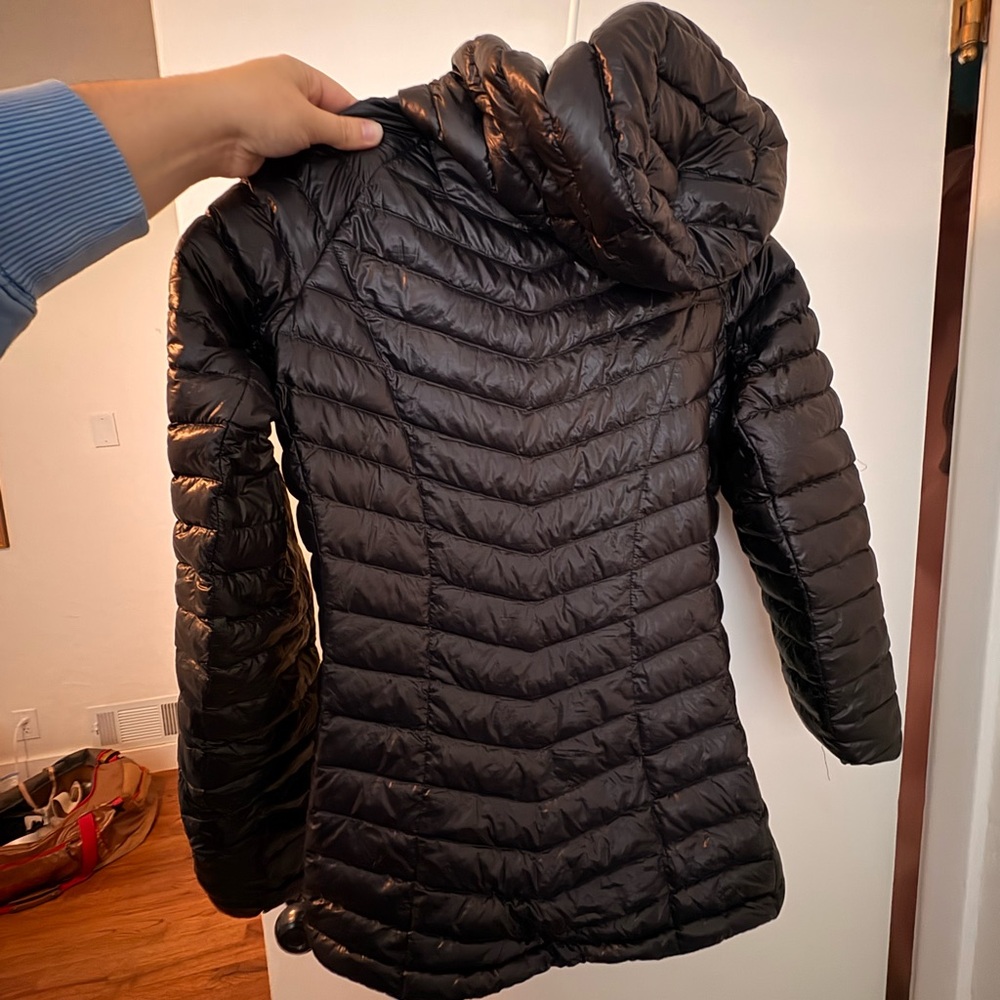 Medium Mountain Hardware puffy with hood.